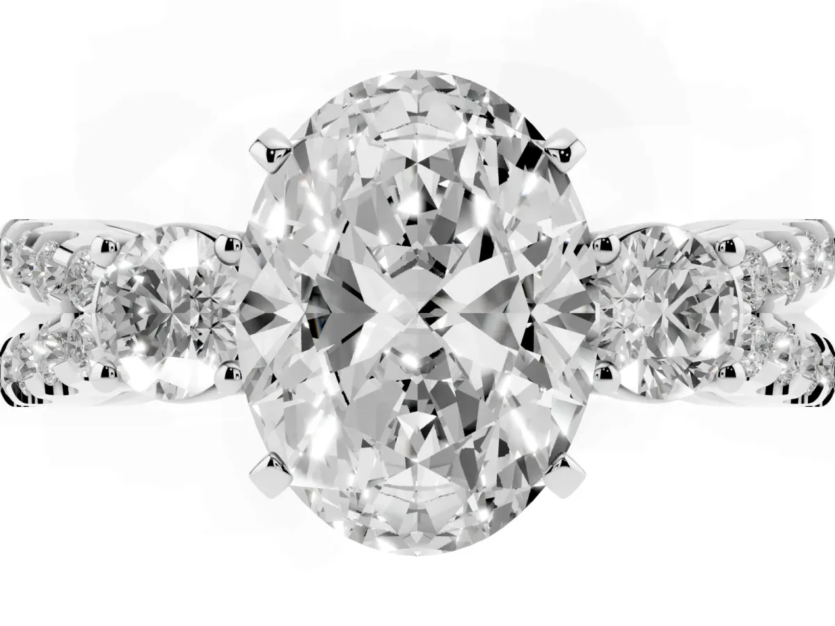 Oval Cut Diamond Three-Stone Ring with Pavé Split Shank and Four-Prong Setting Platinum