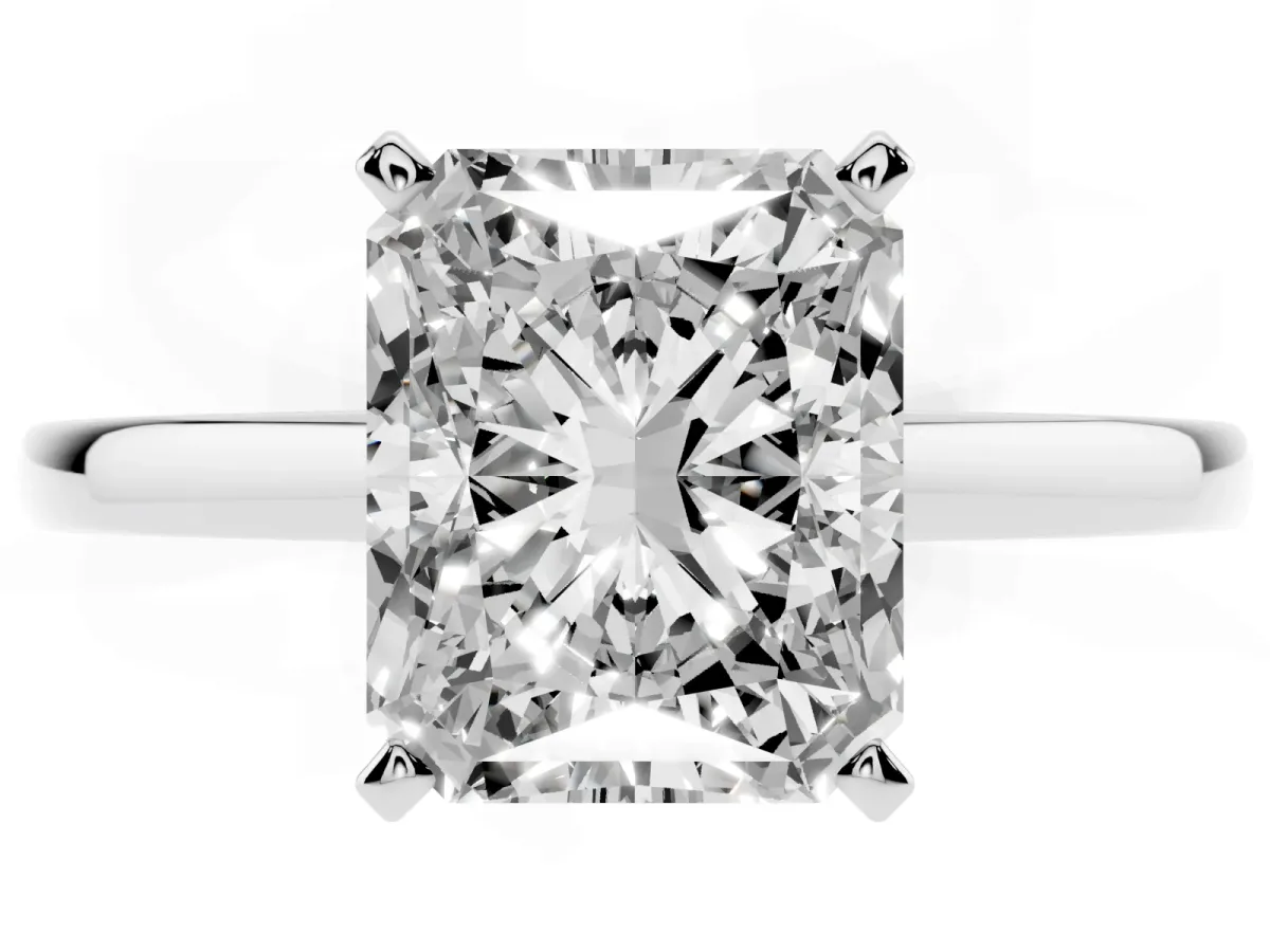 Radiant Cut Solitaire Diamond Engagement Ring with Four-Prong Setting on a Classic Band Silver
