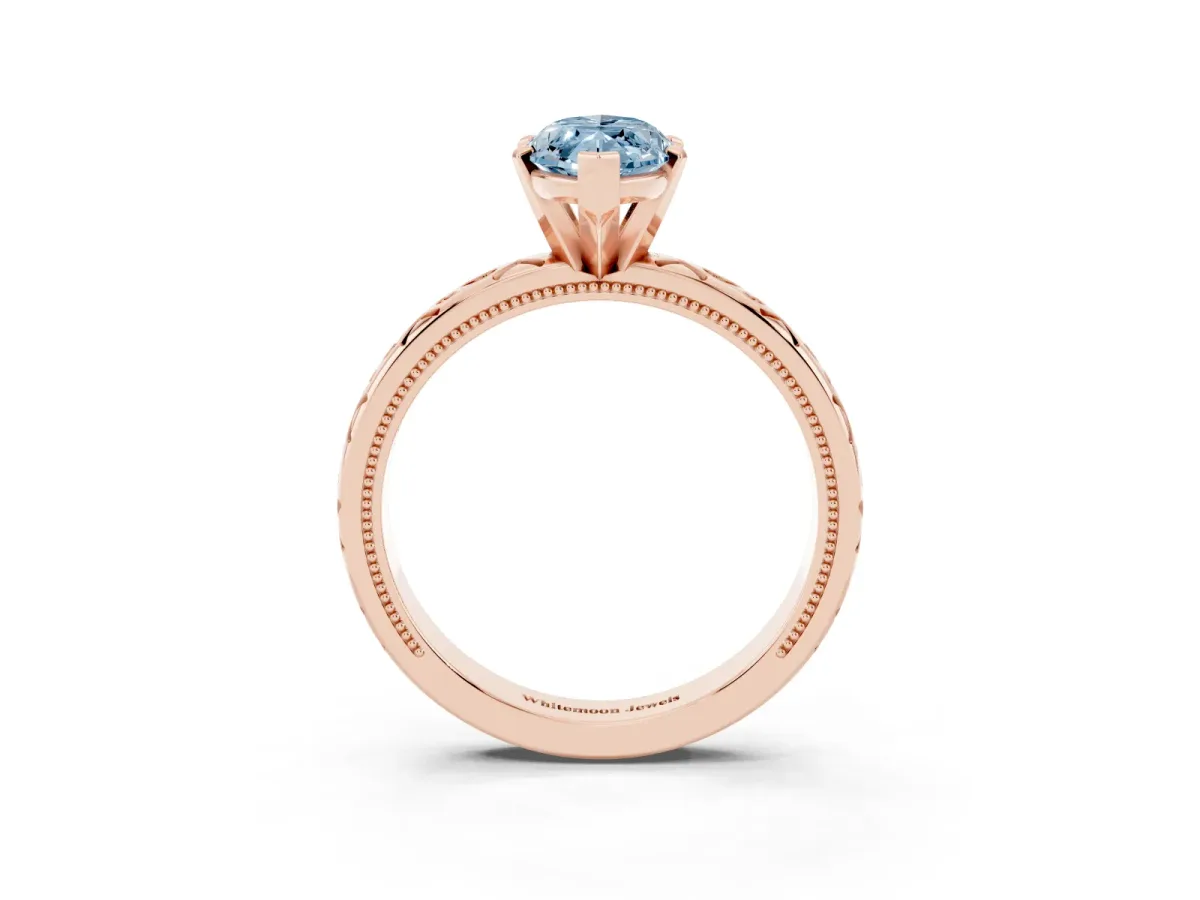 Fancy Blue Marquise Cut Solitaire Engagement Ring with Scrollwork Band and Four-Prong Setting Rose gold
