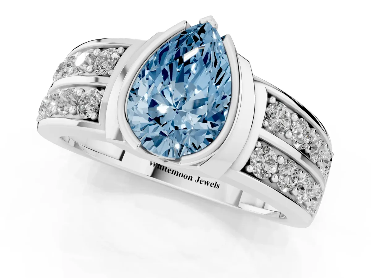 Fancy Blue Pear Cut Brilliant Diamond Channel Set Wide Band Ring with Bezel Setting Platinum