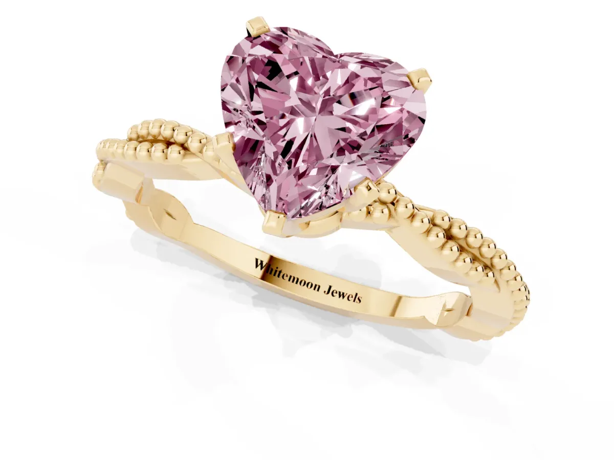 Fancy Pink Heart Cut Solitaire Twisted Band with Bead Prong Setting Yellow gold