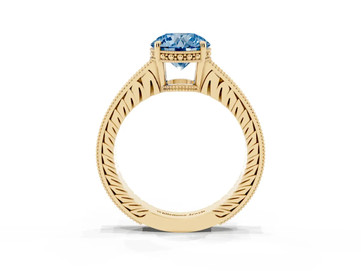 Fancy Blue Round Cut Solitaire Pavé Diamond Milgrain Engagement Ring with Four-Prong Setting Yellow gold