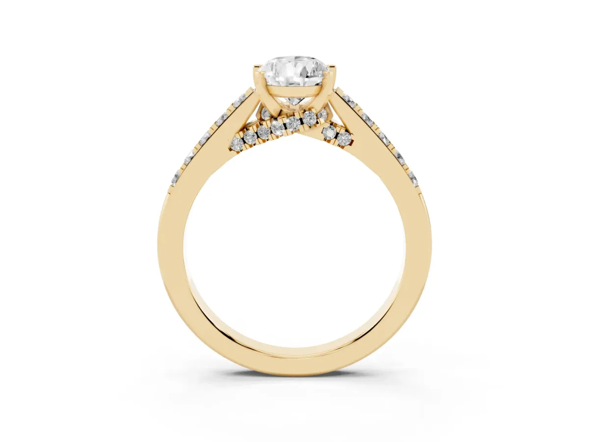 Pear Cut Diamond Solitaire Ring with Crossover Gallery and Round Pavé Band Yellow gold