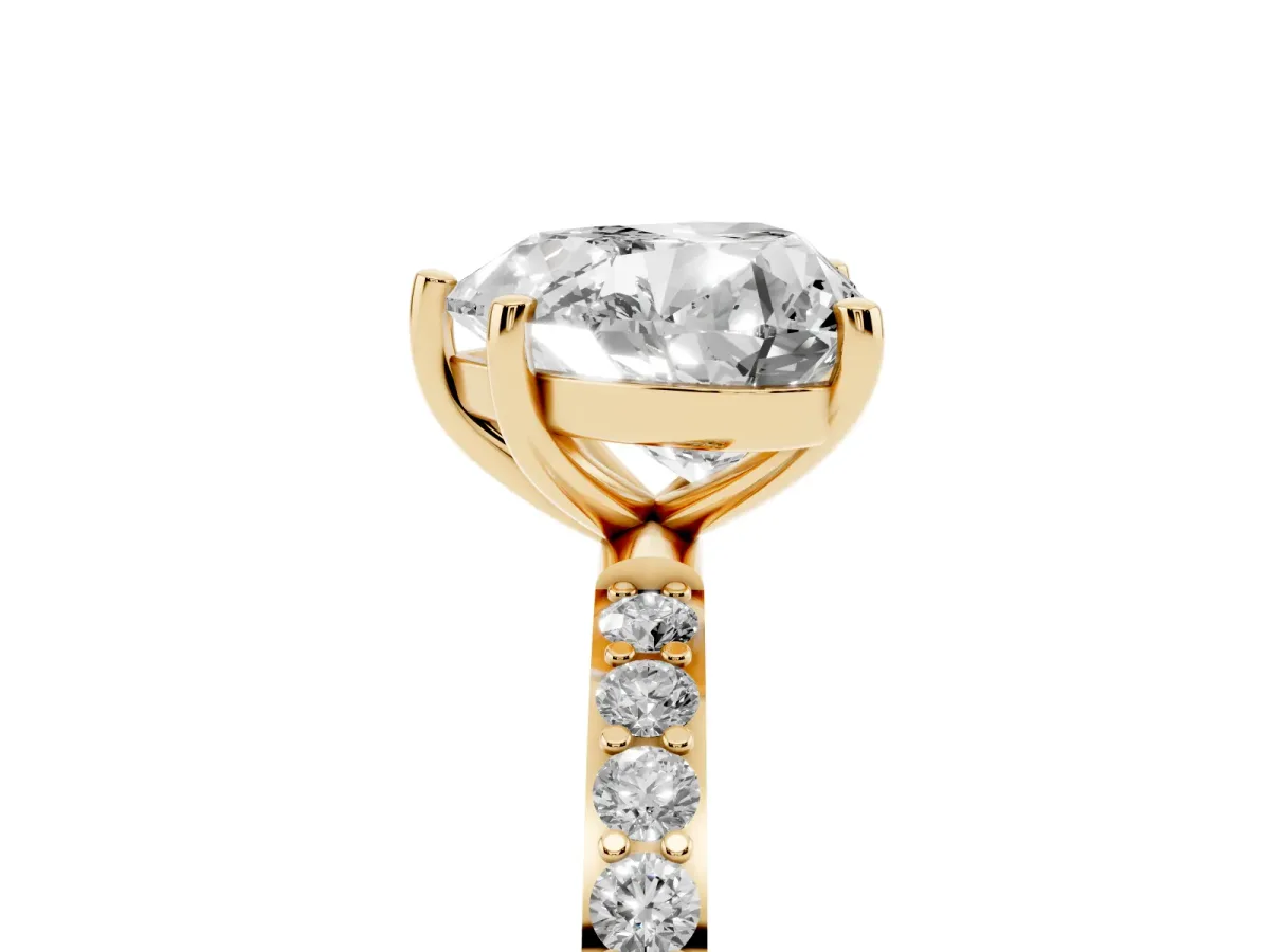 Heart Cut Diamond Solitaire Ring with Round Pavé Shoulders and Prong Setting Yellow gold
