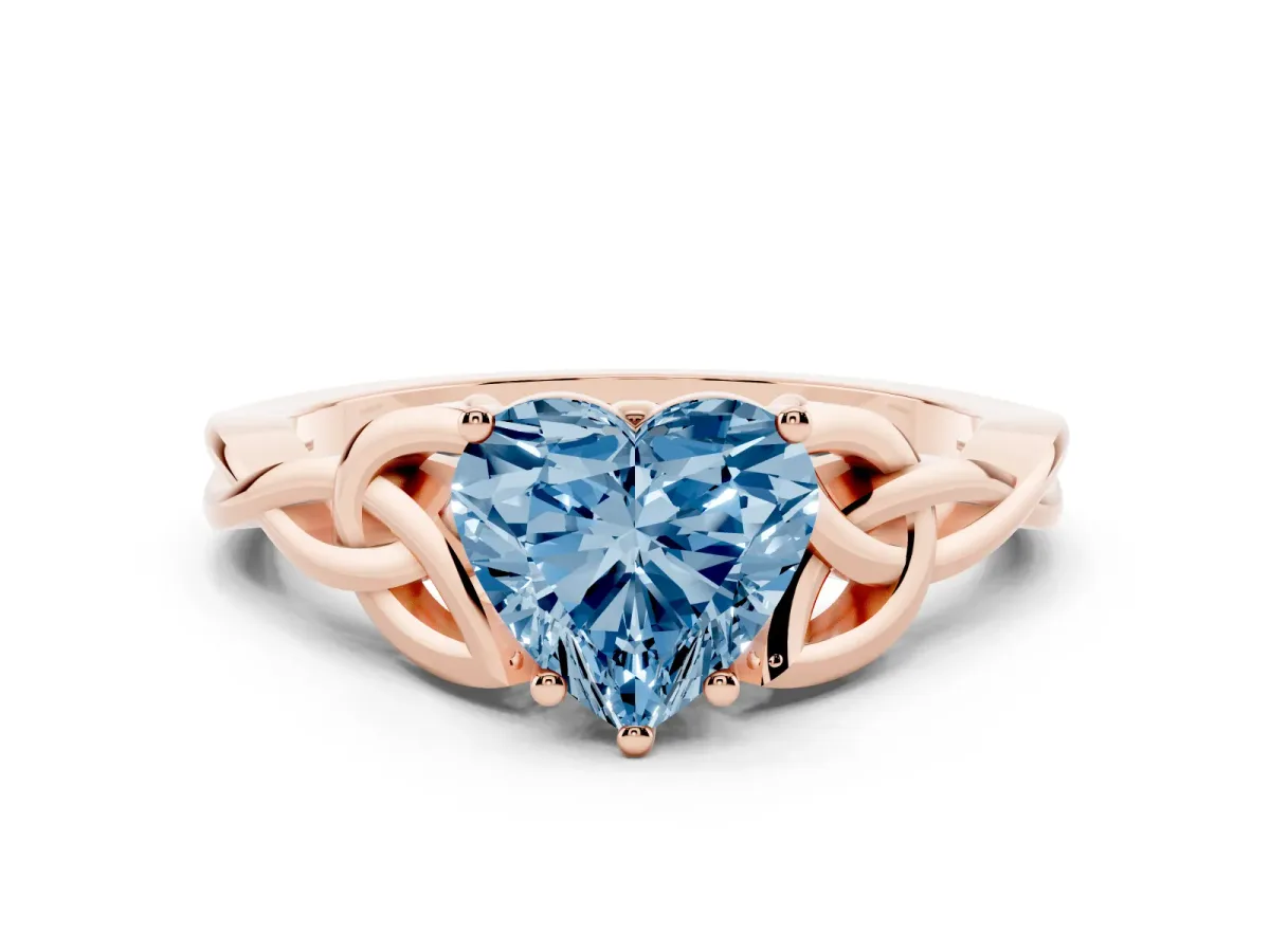 Fancy Blue Heart Cut Diamond Solitaire Engagement Ring with Celtic Knot Band and Four-Prong Setting Rose gold