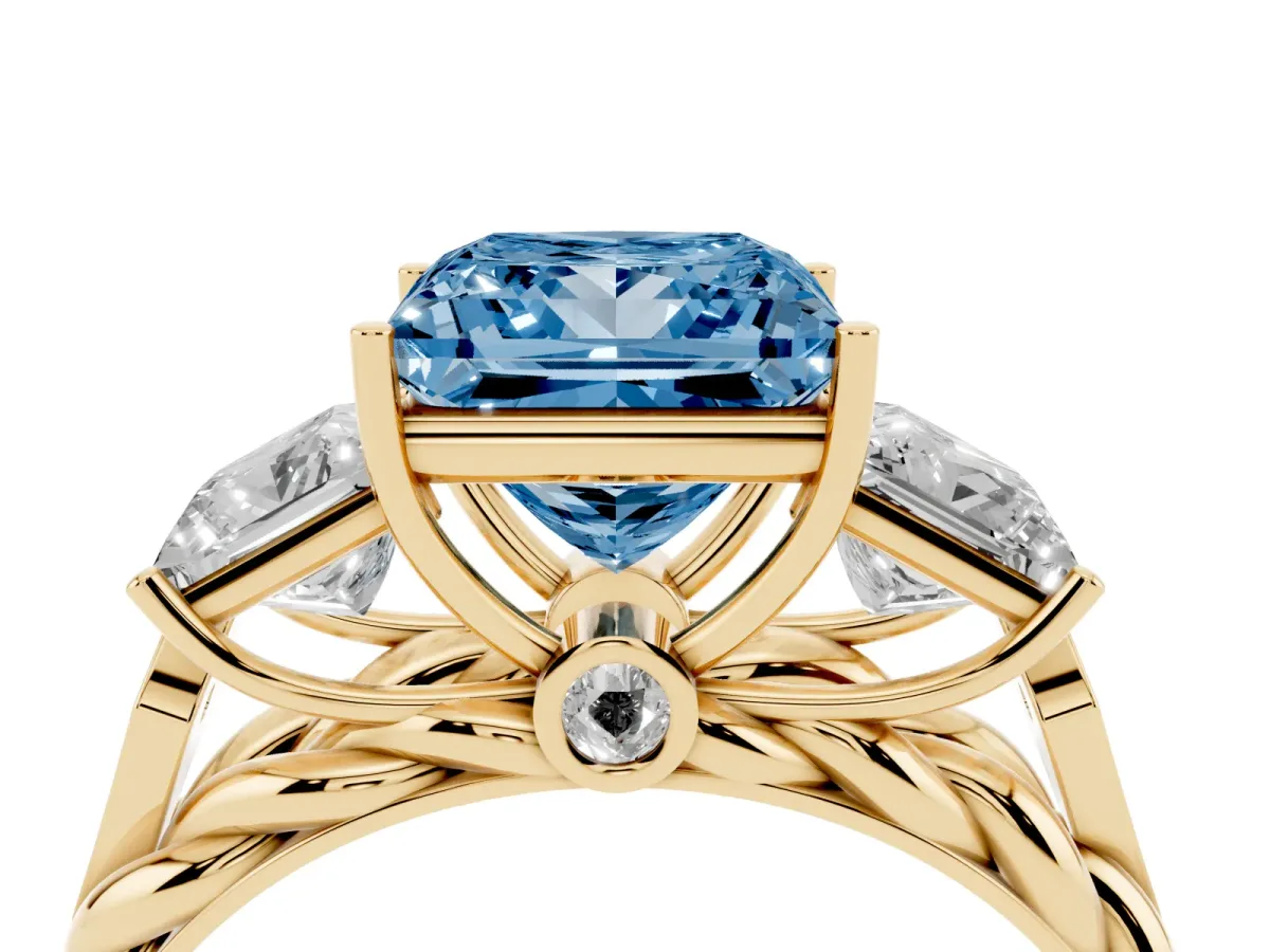 Fancy Blue Three-Stone Princess Cut Diamond Braided Band Ring with Four-Prong Setting Yellow gold
