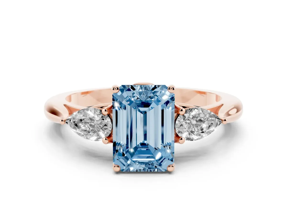 Fancy Blue Emerald Cut Diamond Three-Stone Ring with Pear Side Stones and Prong Setting Rose gold