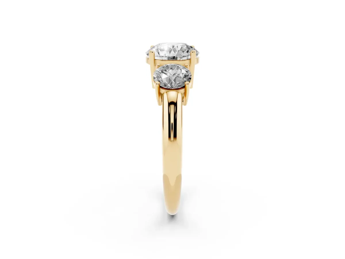 Three-Stone Round Cut Cut Diamond Engagement Ring with Prong Setting on a White Gold Band Yellow gold