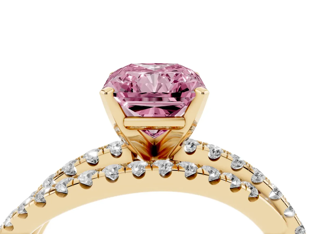 Fancy Pink Radiant Cut Solitaire Twist Band with Pavé Setting and Four-Prong Setting Yellow gold