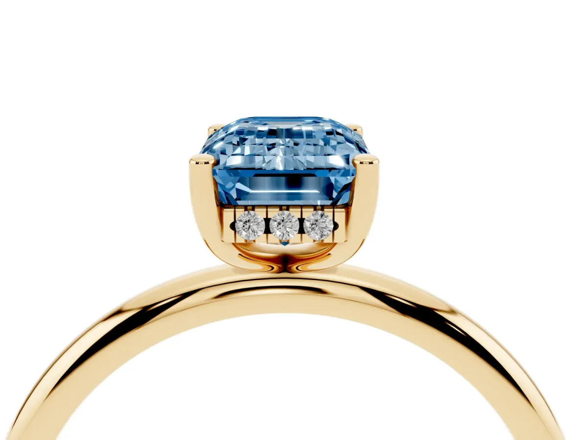 Fancy Blue Emerald Cut Cut Solitaire Engagement Ring with Four-Prong Setting and Classic Band Yellow gold