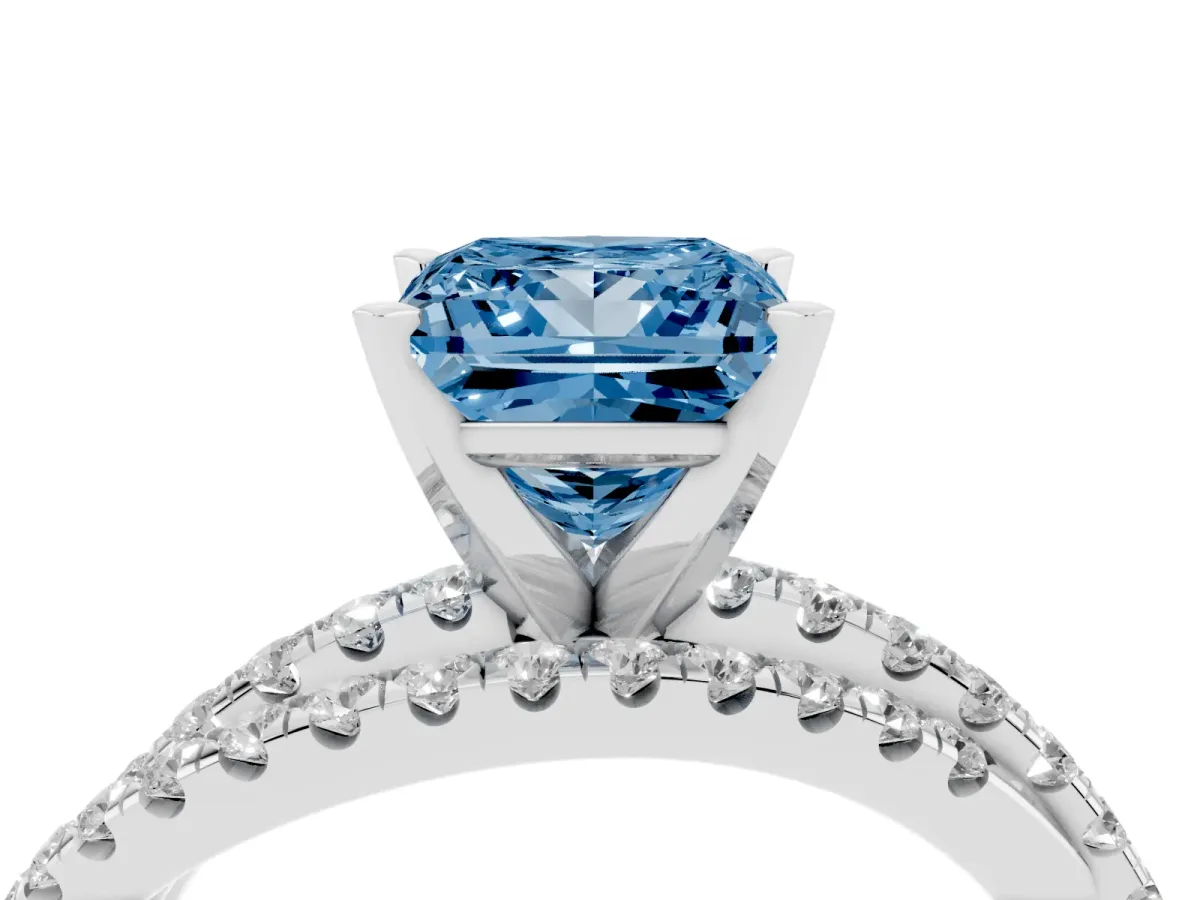 Fancy Blue Princess Cut Solitaire Twist Band with Pavé Setting and Four-Prong Setting Silver
