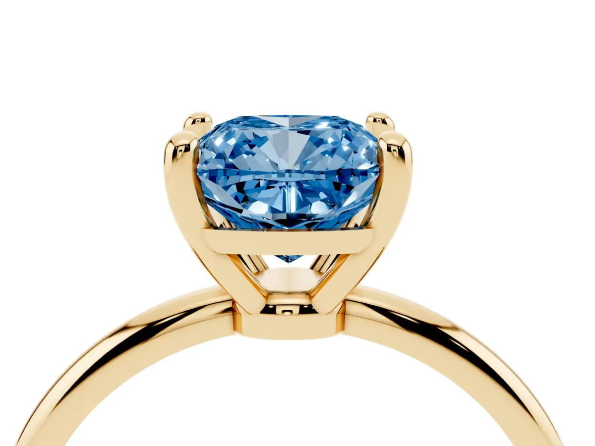 Fancy Blue Cushion Cut Solitaire Diamond Ring with 4-Prong Setting on a Classic Band Yellow gold