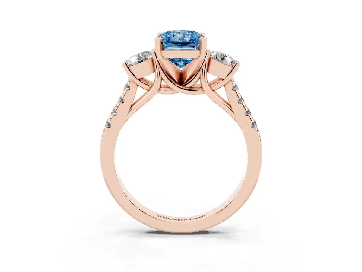 Fancy Blue Three-Stone Radiant Cut Diamond Pavé Band with Four-Prong Setting Rose gold