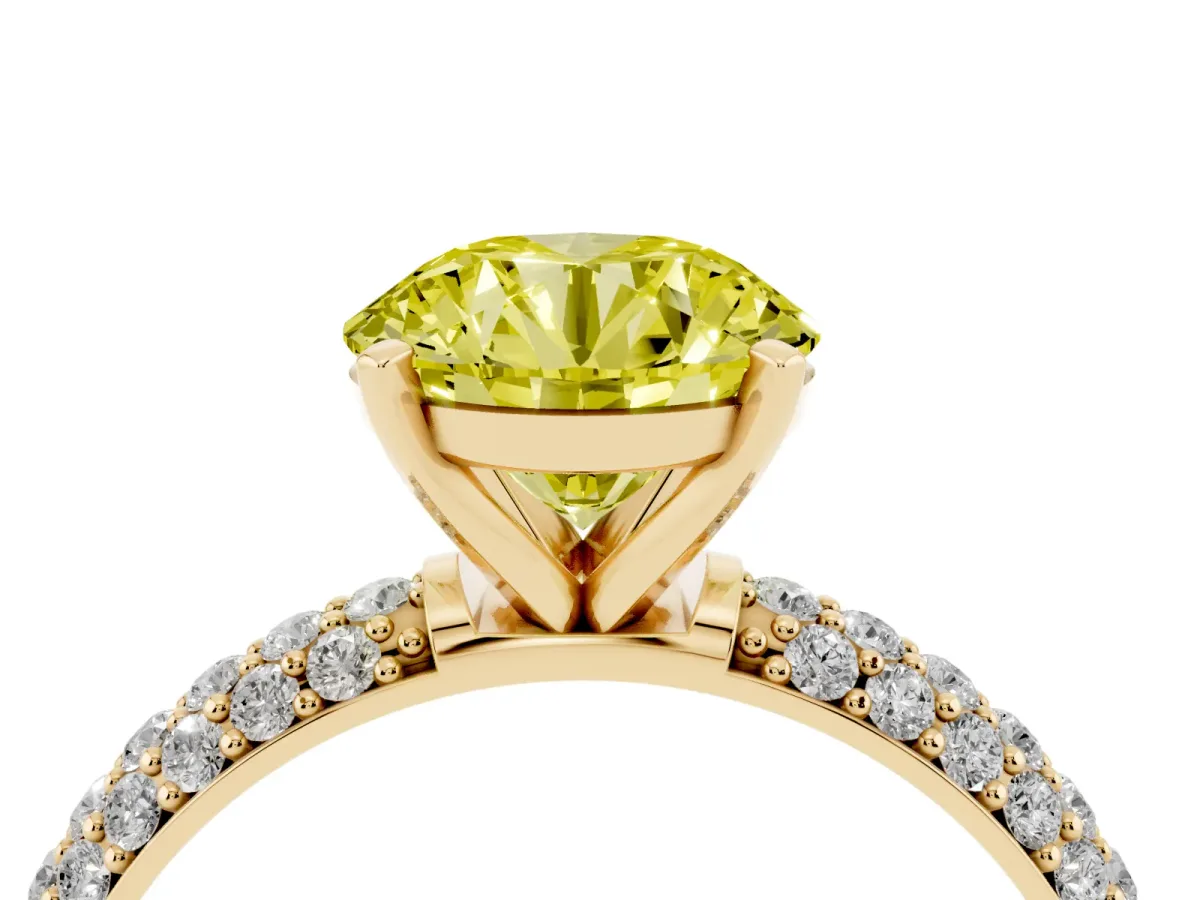 Fancy Yellow Round Cut Diamond Solitaire Ring with Prong Setting and Pavé Band Yellow gold