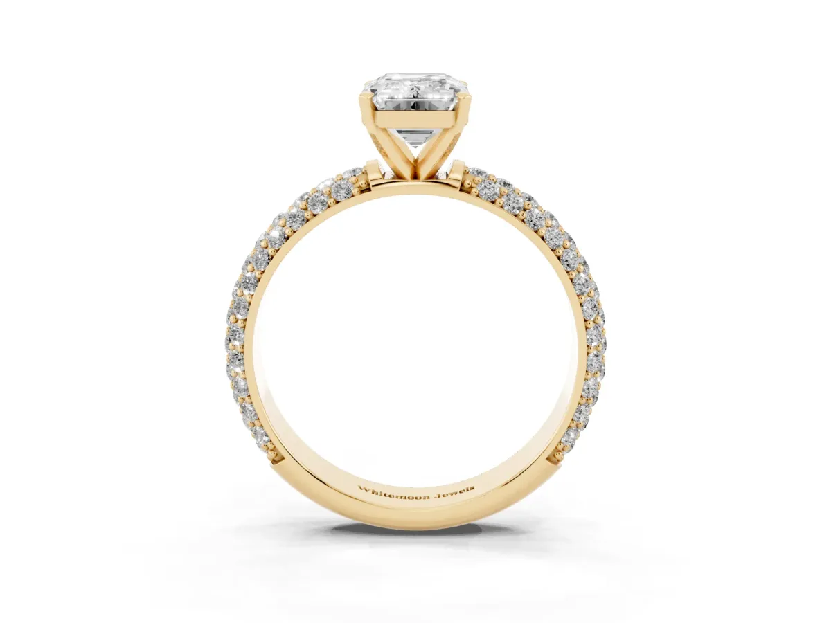 Emerald Cut Diamond Solitaire Ring with Prong Setting and Pavé Band Yellow gold