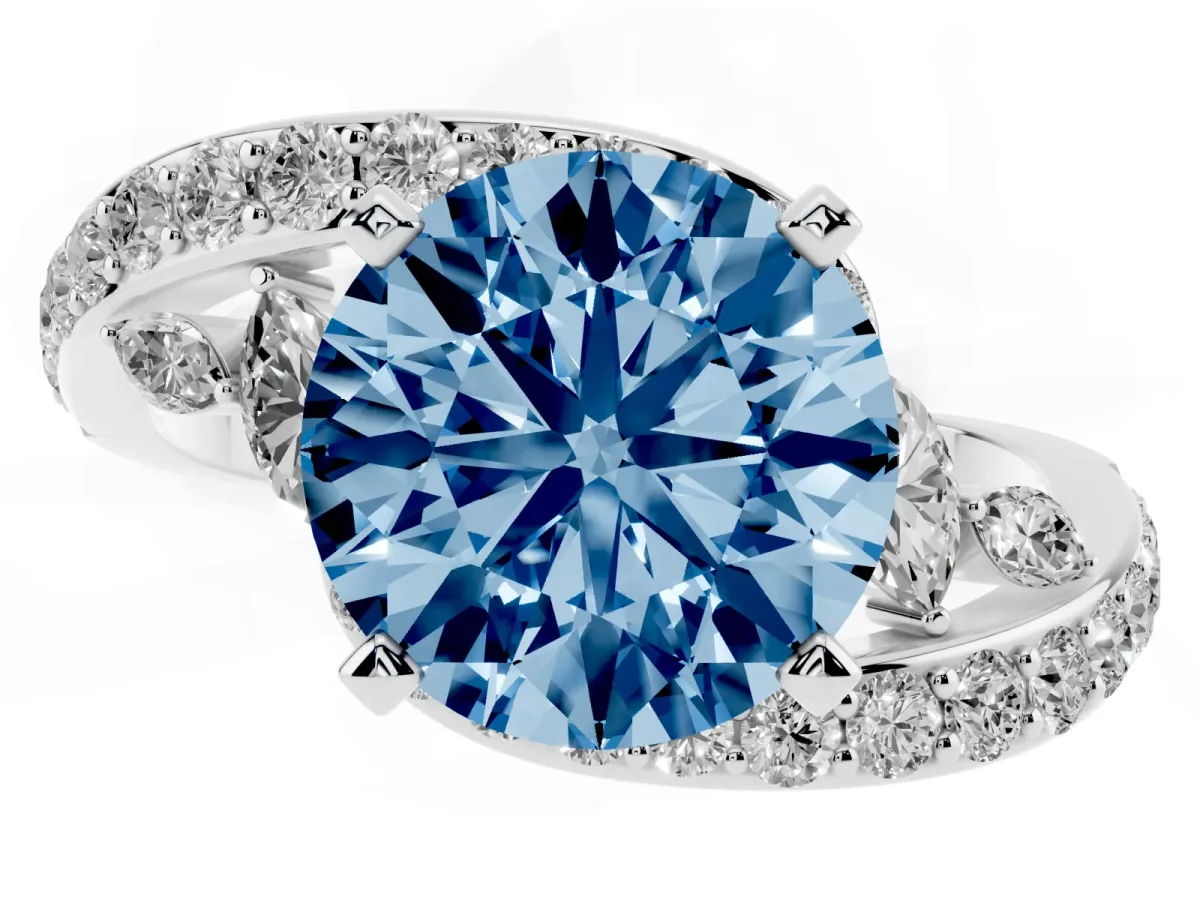 Fancy Blue Round Cut Solitaire with Pavé Twist Band and Four-Prong Setting Silver