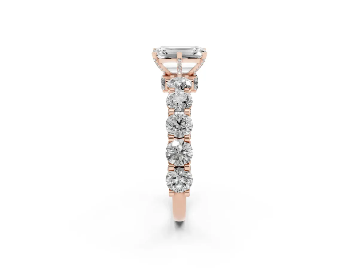 Emerald Cut Diamond Side Stone Engagement Ring with Four-Prong Setting Rose gold