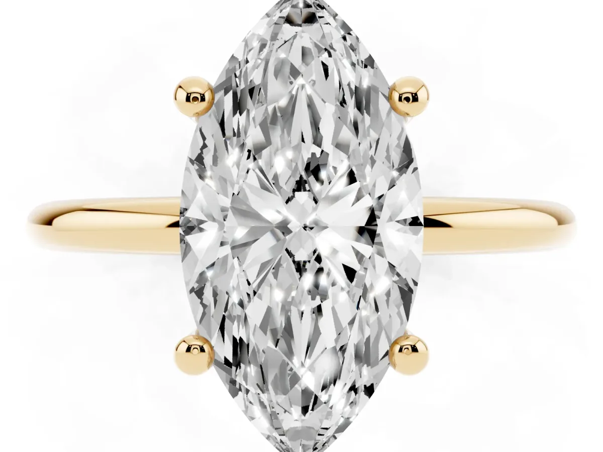 Marquise Cut Solitaire Diamond Ring with 4-Prong Setting on a Classic Band Yellow gold