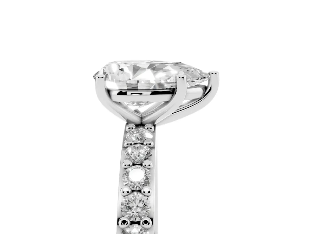 Pear Cut Cut Diamond Solitaire with Pave Band and Four-Prong Setting Silver