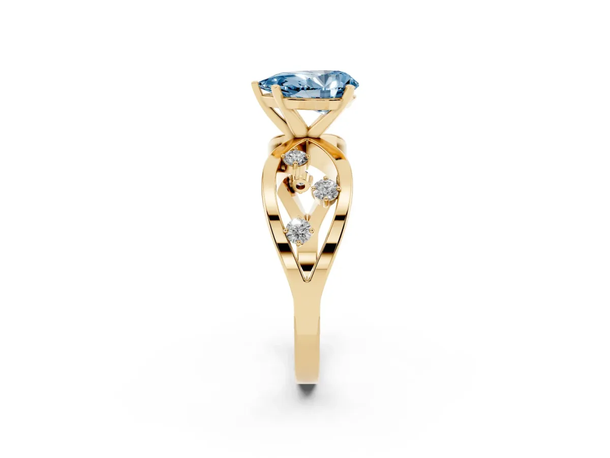 Fancy Blue Pear Cut Cut Solitaire Diamond with Side Stones on Criss-Cross Band and Four-Prong Setting Yellow gold