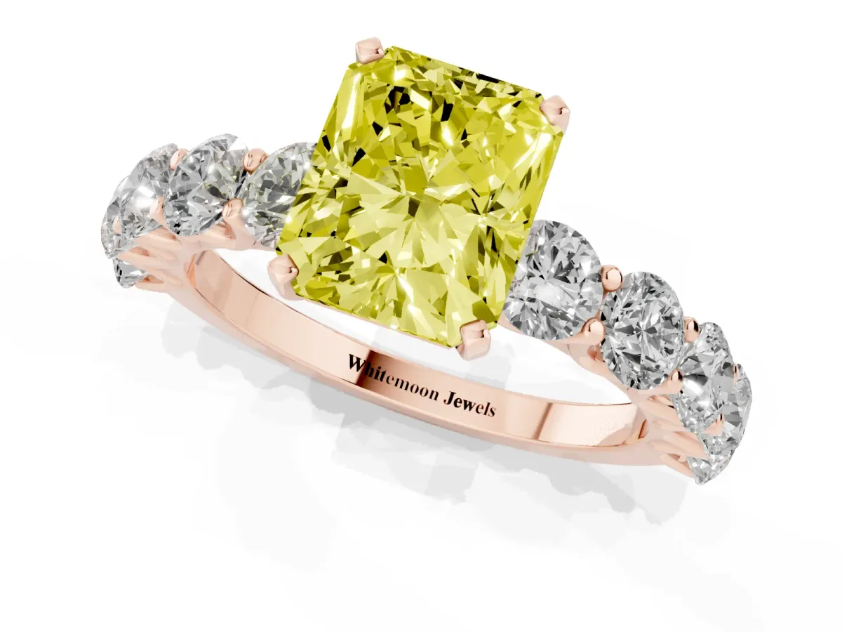 Fancy Yellow Radiant Cut Diamond Prong Setting with Side Stones on a Pave Band Rose gold