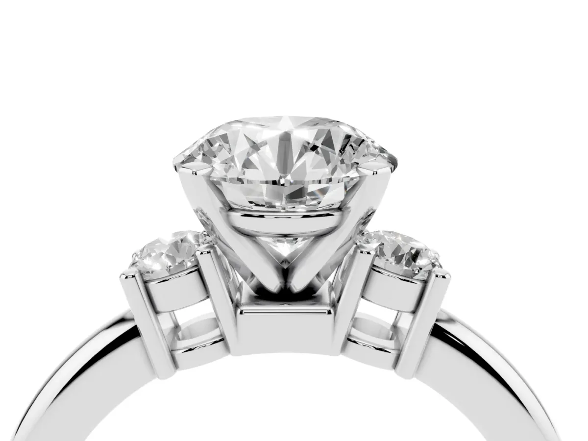 Three-Stone Round Cut Cut Diamond Solitaire with Prong Setting and Classic Band Silver