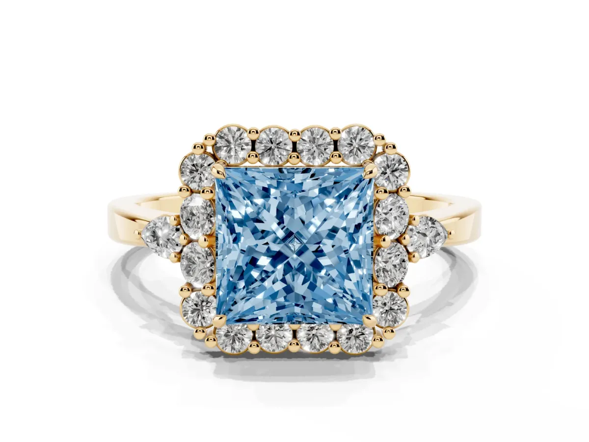Fancy Blue Princess Cut Diamond Halo Ring with Pear Side Stones and Prong Setting Yellow gold