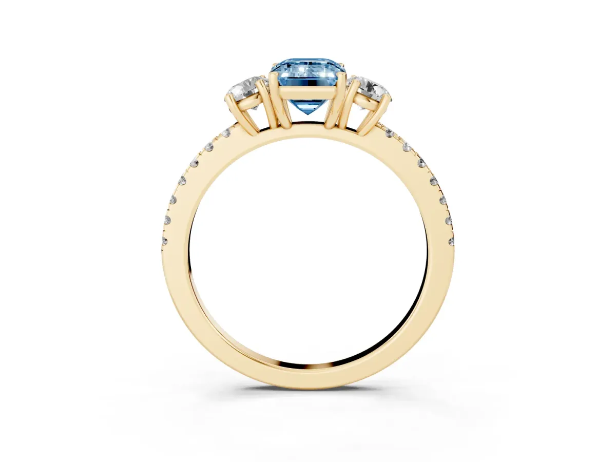 Fancy Blue Three-Stone Emerald Cut Cut Diamond Pavé Band with Prong Setting Yellow gold