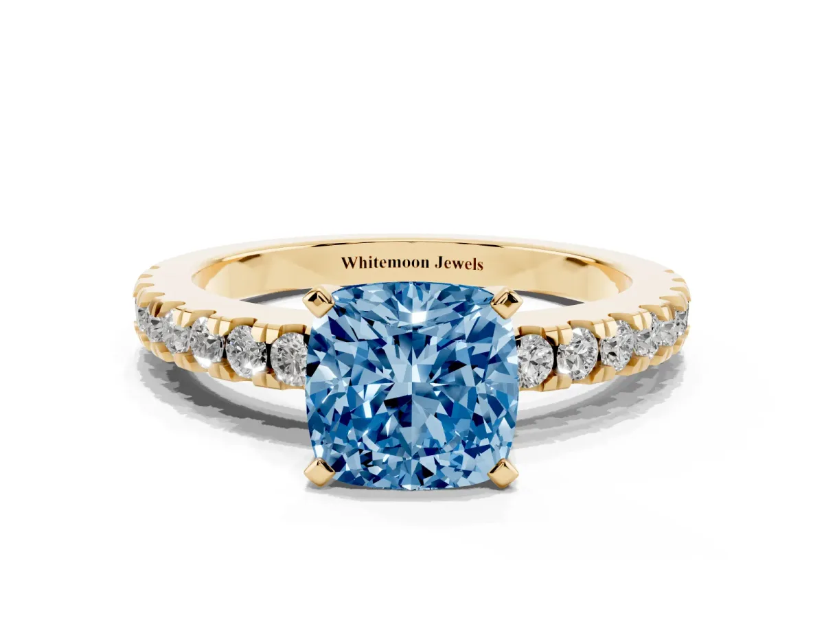 Fancy Blue Cushion Cut Solitaire Diamond with Pavé Band and Four-Prong Setting Yellow gold