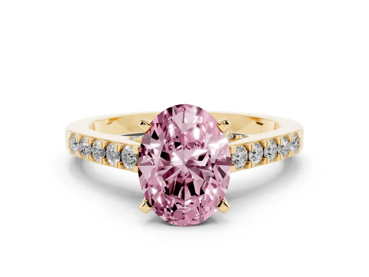 Fancy Pink Oval Cut Diamond Solitaire Ring with Crossover Gallery and Round Pavé Band Yellow gold