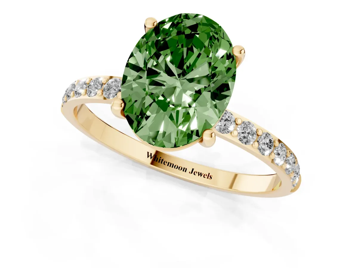Fancy Green Oval Cut Diamond Solitaire Ring with Round Pavé Shoulders and Prong Setting Yellow gold
