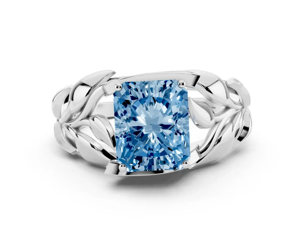Fancy Blue Radiant Cut Diamond Leaf-Inspired Engagement Ring with Round Accents and Prong Setting White gold