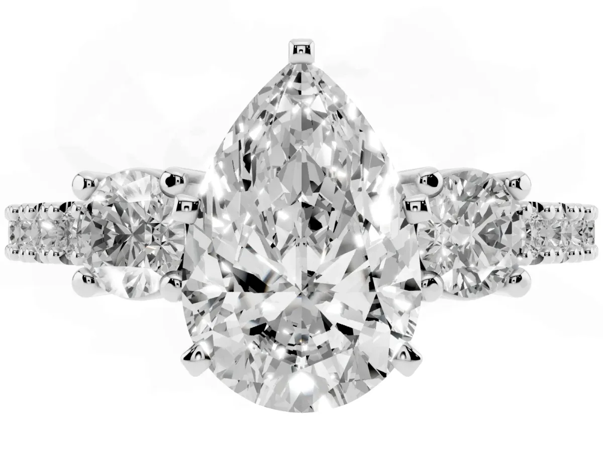 Pear Cut Three-Stone Diamond Pavé Band with Prong Setting Platinum