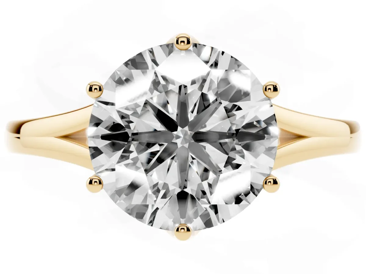Round Cut Solitaire Diamond Ring with Six-Prong Setting and Tapered Band Yellow gold