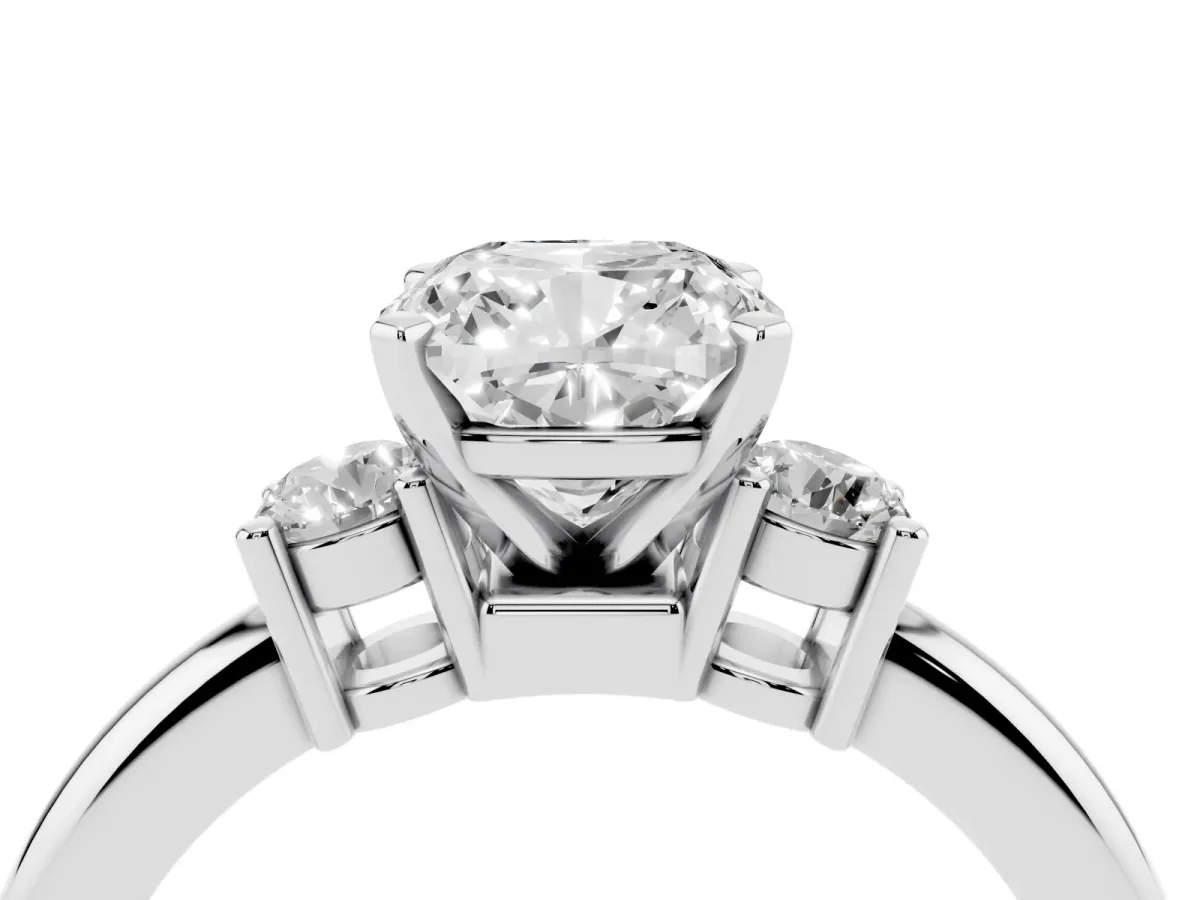 Three-Stone Cushion Cut Cut Diamond Solitaire with Prong Setting and Classic Band Platinum