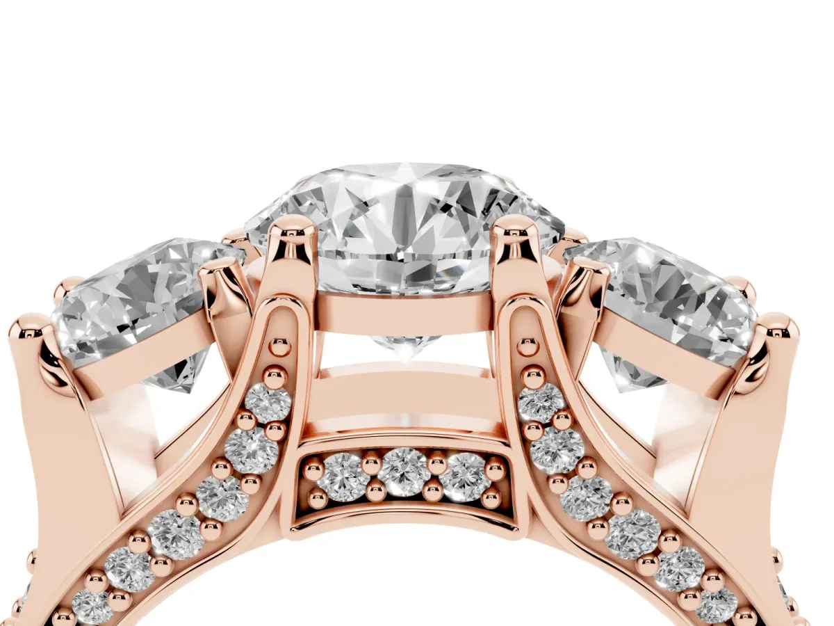 Round Cut Diamond Three-Stone Ring with Channel Set Band and Four-Prong Setting Rose gold