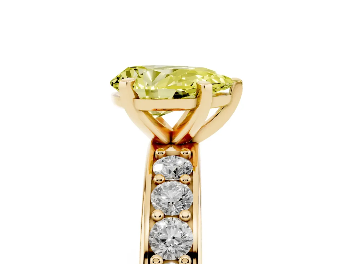 Fancy Yellow Pear Cut Diamond Engagement Ring with Channel Set Round Band and Prong Setting Yellow gold