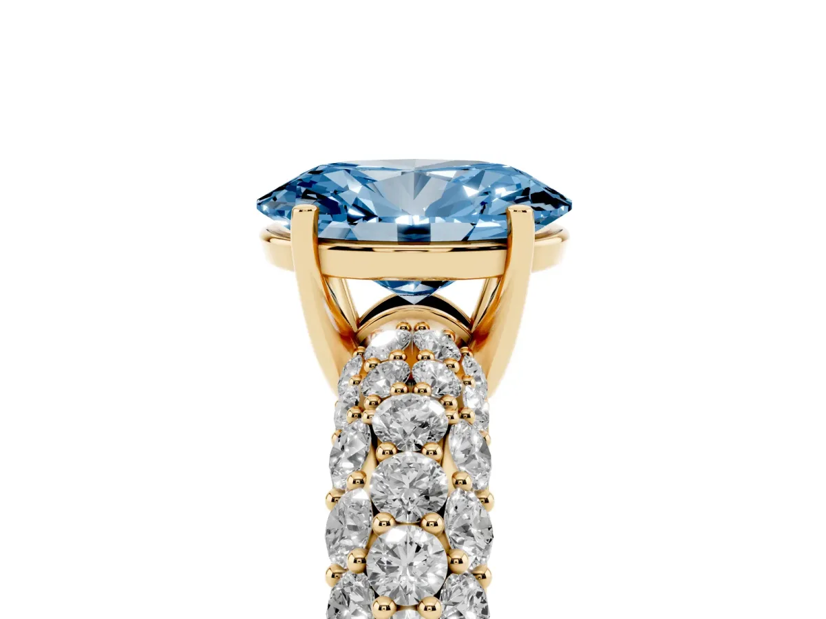Fancy Blue Oval Cut Diamond Pavé Band Solitaire Ring with Four-Prong Setting Yellow gold