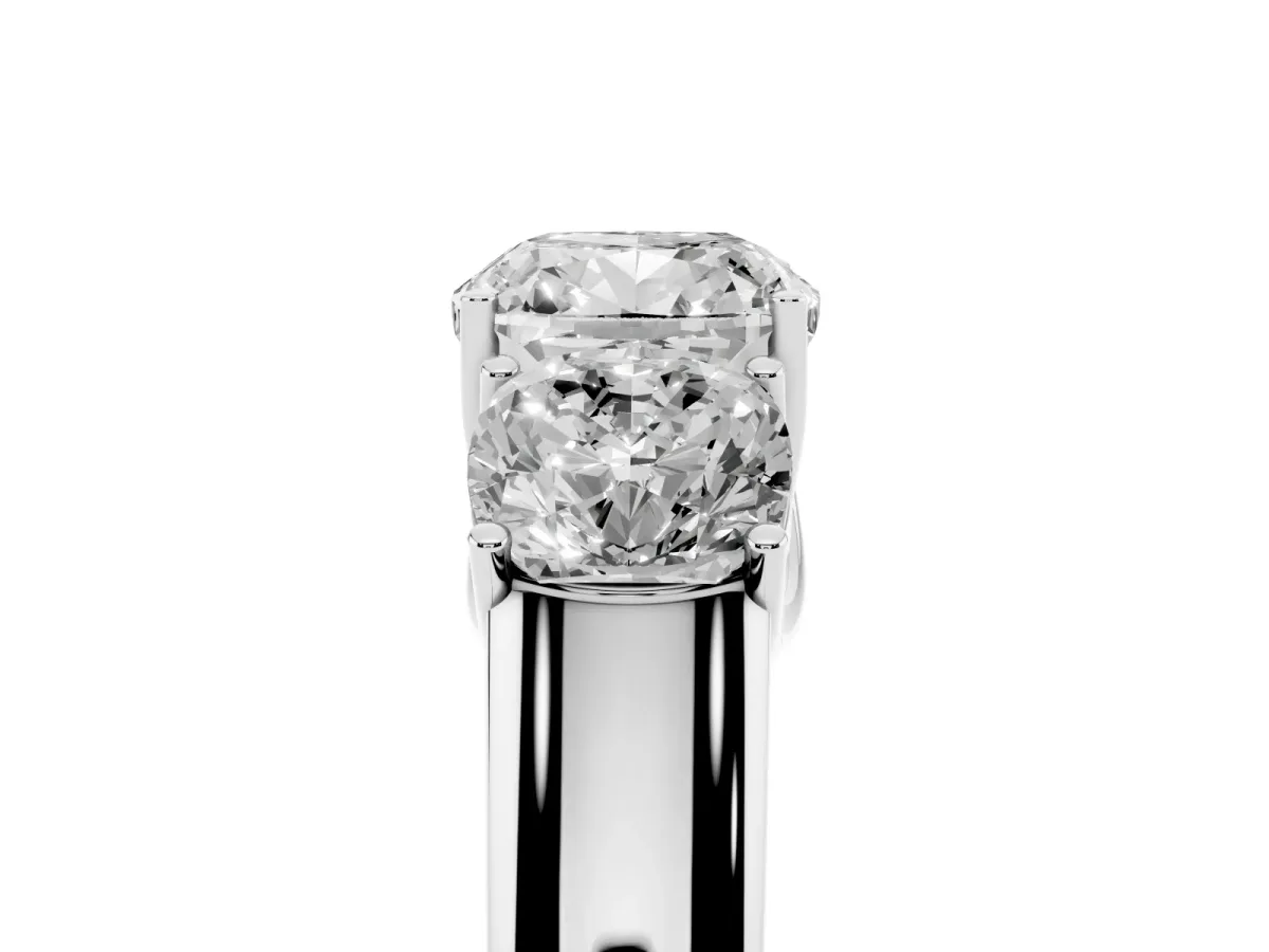 Three-Stone Cushion Cut Cut Diamond Ring with Prong Setting and Classic Band Platinum