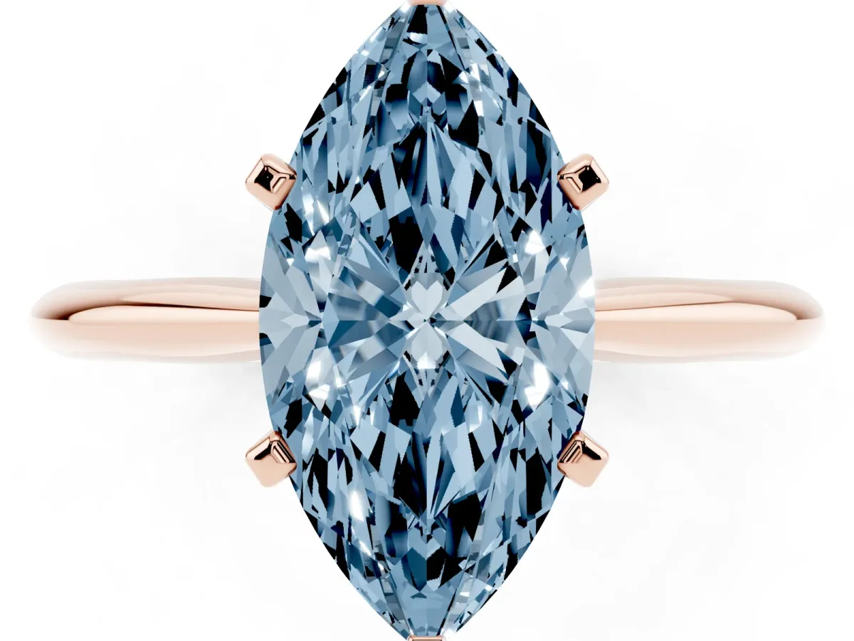 Fancy Blue Marquise Cut Cut Solitaire Ring with Four-Prong Setting on a Classic Band Rose gold
