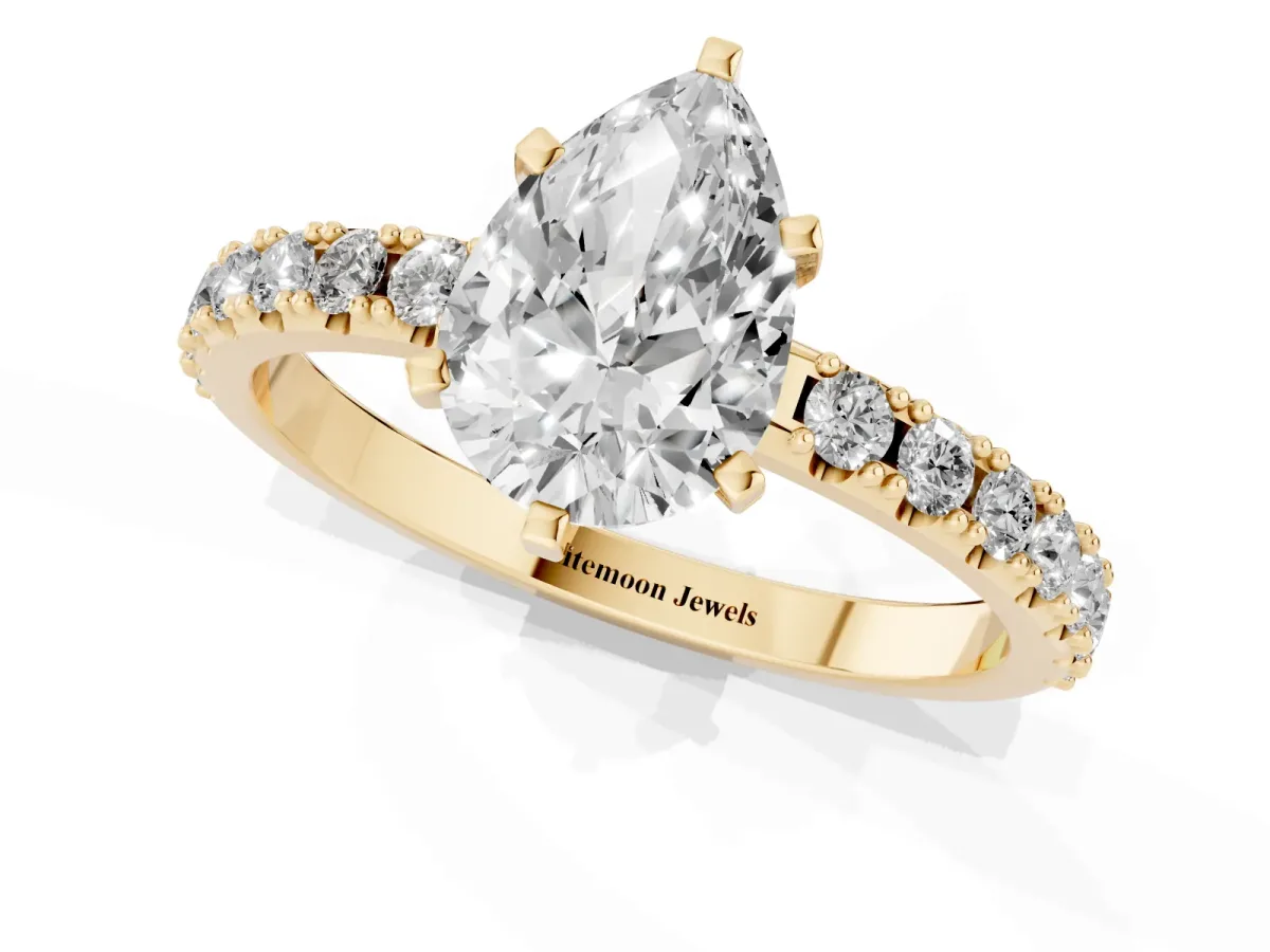 Pear Cut Diamond Solitaire Pavé Band with Four-Prong Setting Yellow gold