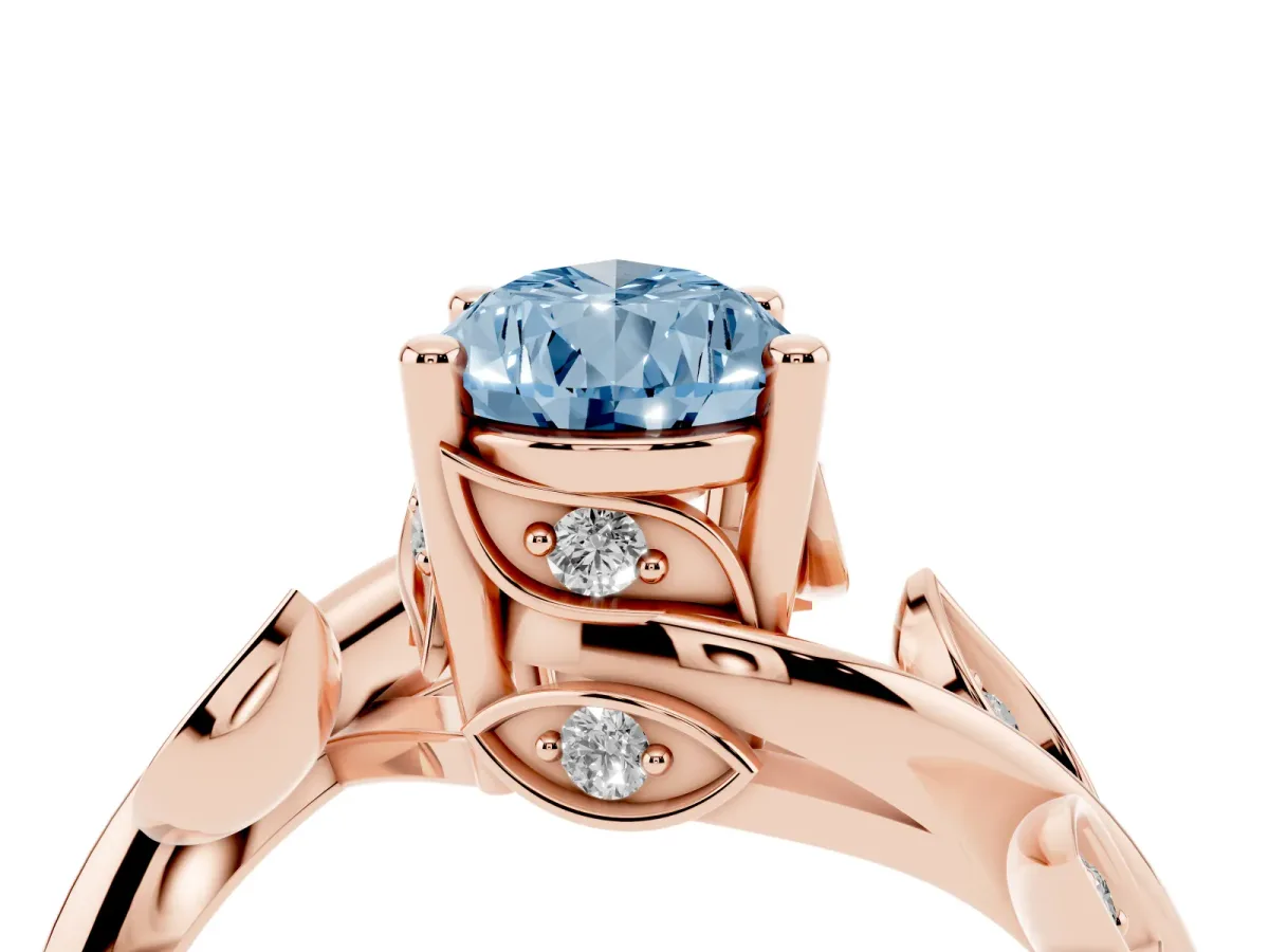 Fancy Blue Pear Cut Solitaire Twist Engagement Ring with Leaf Accents and Prong Setting Rose gold