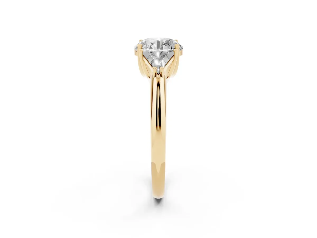 Three-Stone Round Cut Diamond Engagement Ring with Trillion Side Stones and Prong Setting Yellow gold