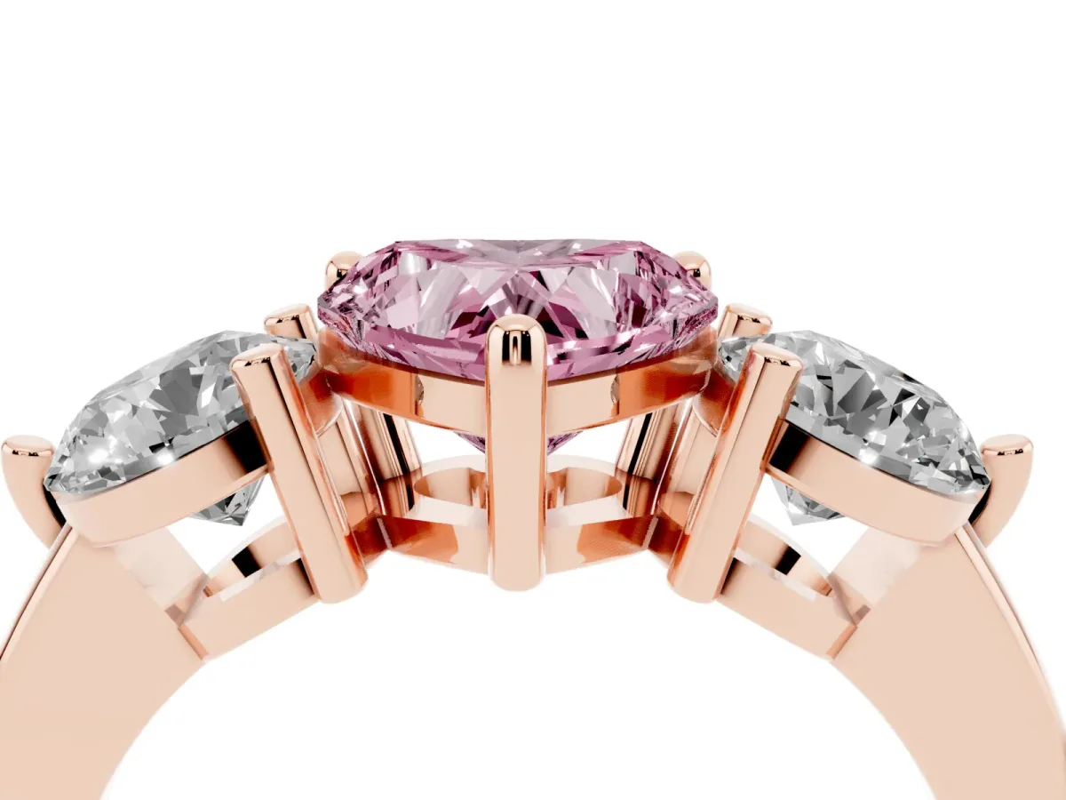 Fancy Pink Three-Stone Heart Cut Brilliant Cut Solitaire Ring with Prong Setting on a Classic Band Rose gold