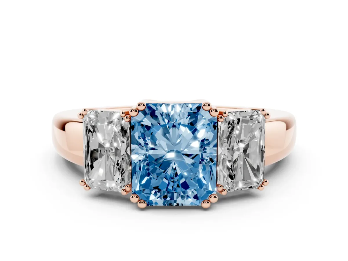 Fancy Blue Three-Stone Radiant Cut Cut Diamond Ring with Channel Set Band and Four-Prong Setting Rose gold