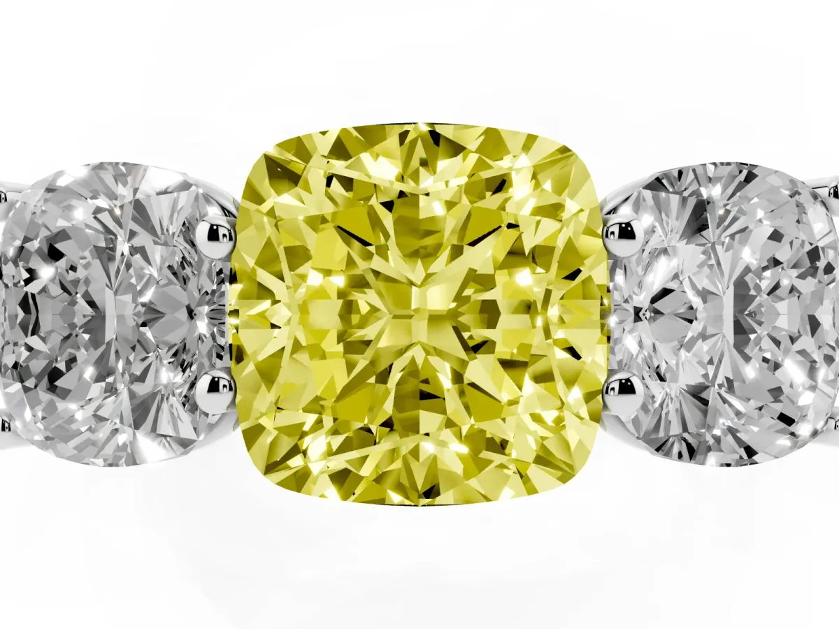 Fancy Yellow Cushion Cut Three-Stone Diamond Ring with Prong Setting on a Classic Band Platinum