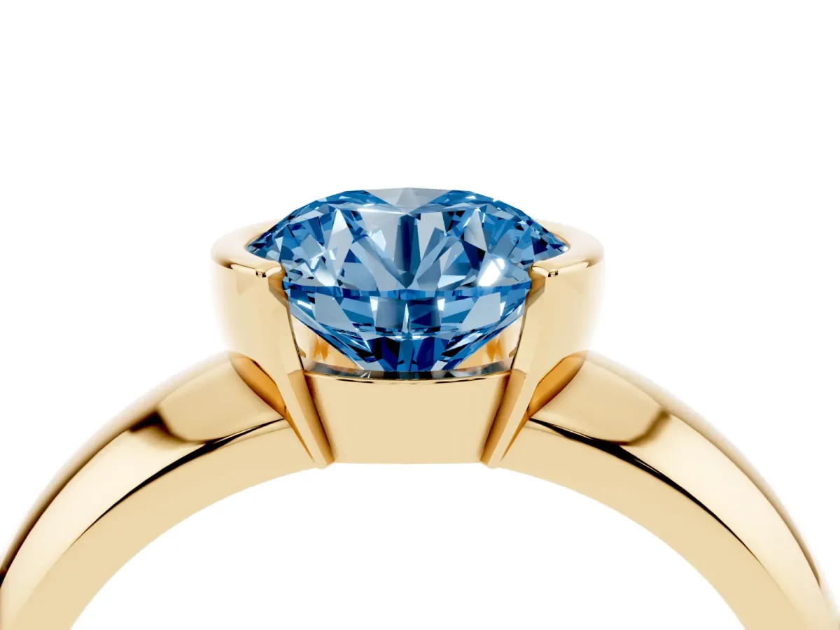 Fancy Blue Round Cut Solitaire Tension Set Diamond Ring with Wide Band Yellow gold