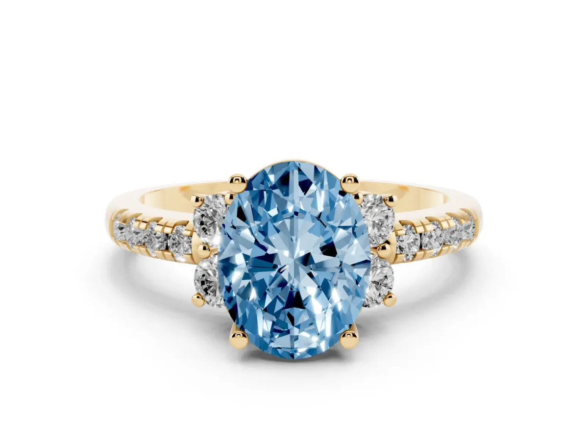 Fancy Blue Oval Cut Diamond Three-Stone Pave Band with Four-Prong Setting Yellow gold