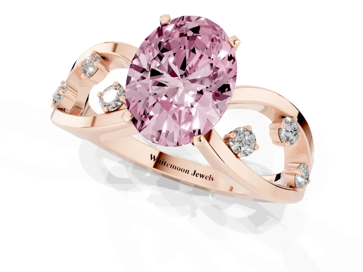 Fancy Pink Oval Cut Cut Solitaire Diamond with Side Stones on Criss-Cross Band and Four-Prong Setting Rose gold
