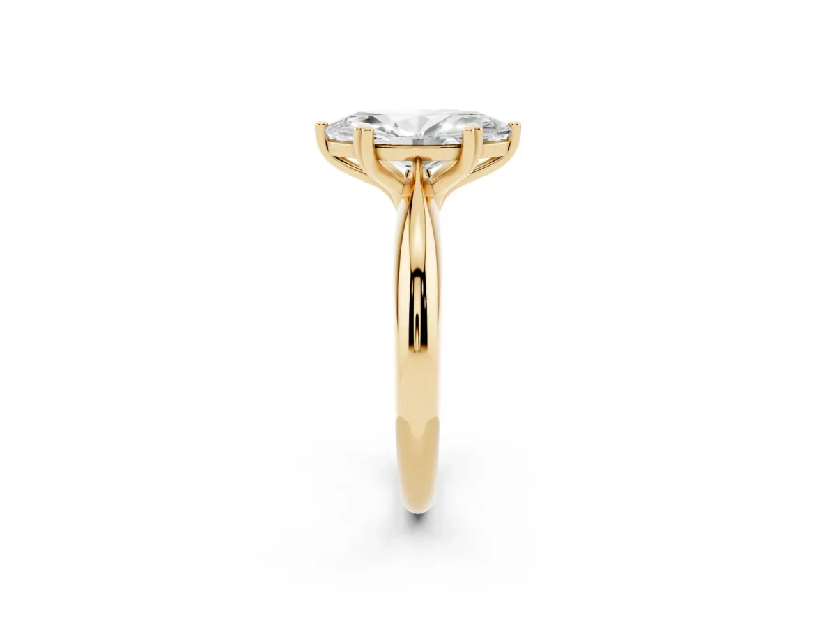 Marquise Cut Cut Solitaire Engagement Ring with Tapered Band and Four-Prong Setting Yellow gold